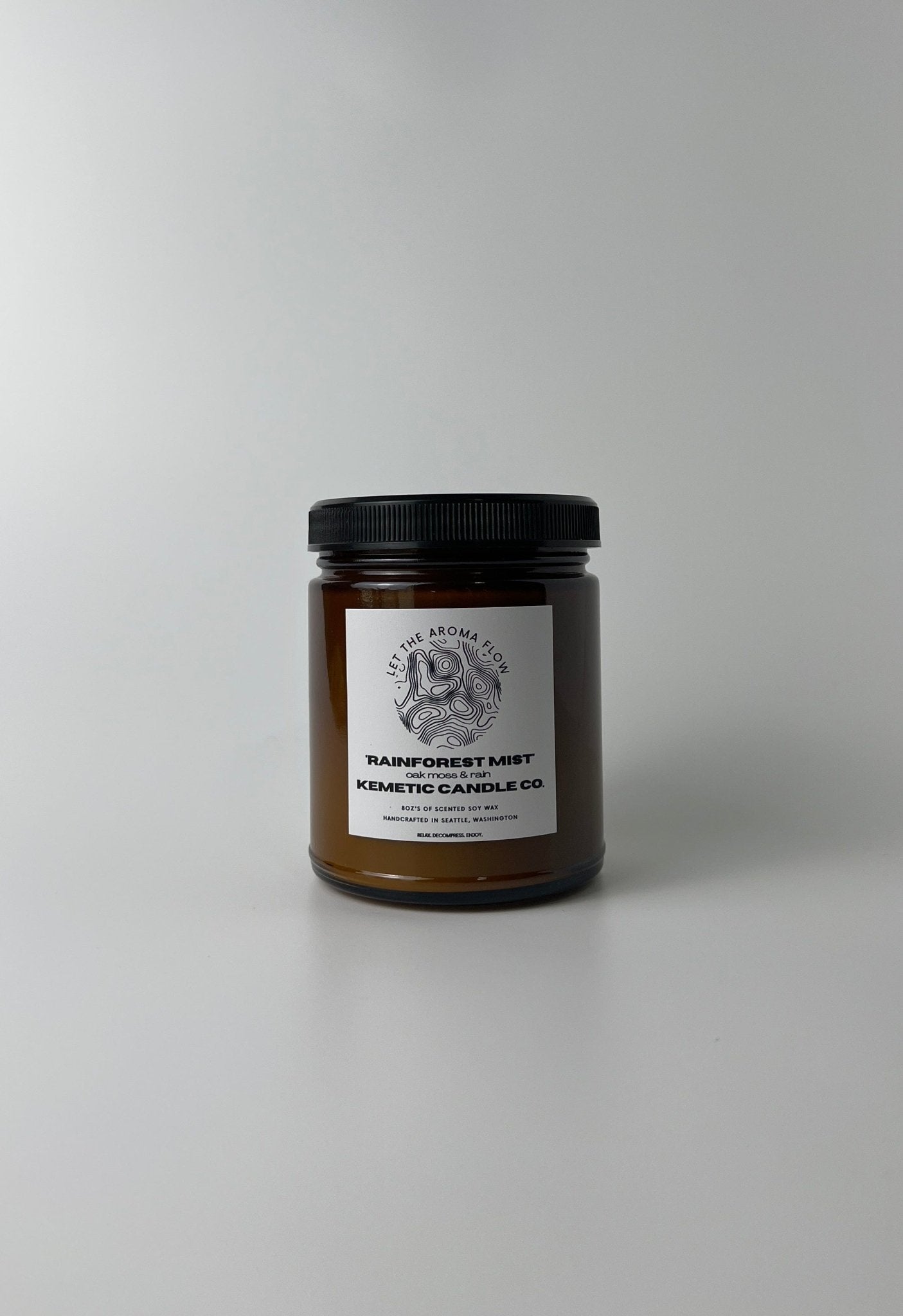 Bring the refreshing scent of the Pacific North West rainforest into your home with Kemetic Candle Co.'s Rainforest Mist 8 oz candles. Shop now and experience nature's tranquility.